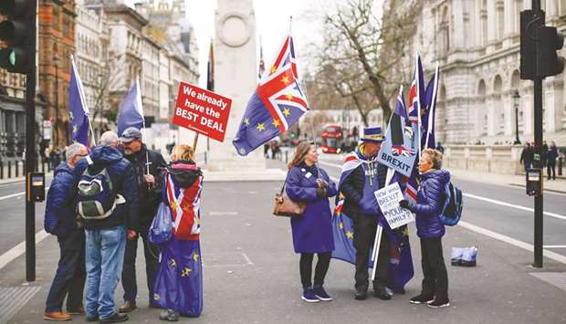 Anti-Brexit protestors gather outside Downing Street, on Whitehall in central London yesterday.