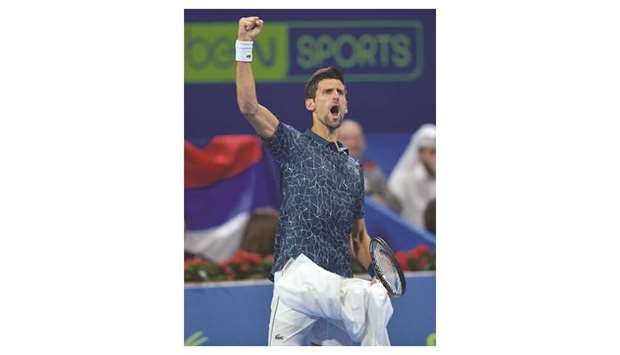Novak Djokovic of Serbia celebrates his victory over Marton Fucsovics (not pictured) of Hungary during their Qatar ExxonMobil Open second round match at Khalifa International Tennis and Squash Complex yesterday. PICTURES: Noushad Thekkayil