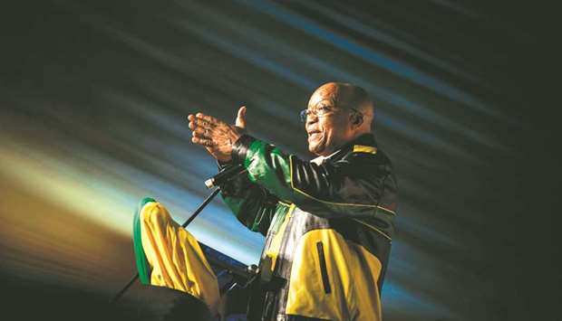 In this file photo taken on April 12, 2017 South Africau2019s former president Jacob Zuma gestures during celebrations for his 75th birthday in Kliptown, Soweto. Former South African president Jacob Zumau2019s plan to record an album of apartheid-era struggle songs sparked off a political row yesterday.