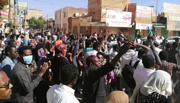 Sudanese protesters chant slogans during an anti-government demonstration in the capital Khartoum.