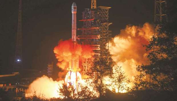 This file picture shows a Long March 3B rocket, transporting the Changu2019e-4 lunar rover, lifting off from the Xichang launch centre in Xichang in Chinau2019s southwestern Sichuan province. Chinau2019s Changu2019e-4 lunar rover landed on the far side of the moon last week, the first probe to do so.