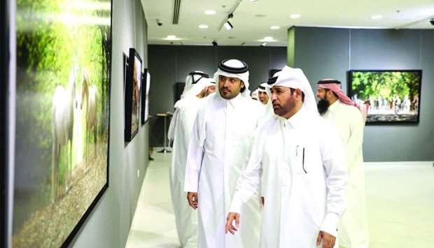 Dr Khalid bin Ibrahim al-Sulaiti and photographer Omar al-Hammadi at the inauguration of u201cAl Adiyatu201d photography exhibition at Katara
