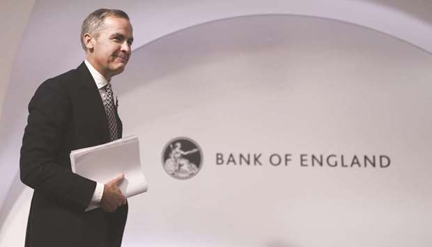 Mark Carney, governor of the Bank of England, departs following the banku2019s Monetary Policy Report news conference in the City of London (file). While the economy appears to be strengthening, Carney says there may be a need to do more to secure the recovery. His dovish tone comes as two members of the Monetary Policy Committee are already pushing for interest-rate reductions.