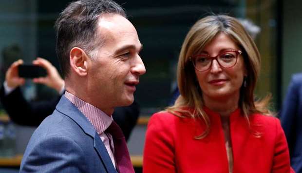 Germany's Foreign Minister Heiko Maas and Bulgaria's Foreign Minister Ekaterina Zaharieva arrive at a European Union foreign ministers emergency meeting to discuss ways to try to save the Iran nuclear deal, in Brussels, Belgium
