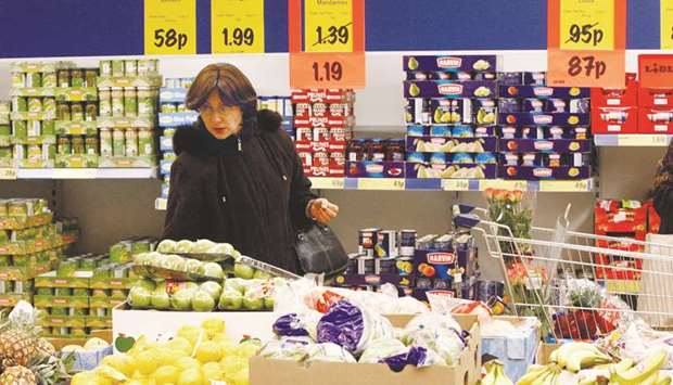 A shopper browses at a Lidl store in Tottenham, north London. Lidl GB said its total sales rose 11% in the four weeks to December 29, confirming it as the UKu2019s fastest growing stores-based grocer.