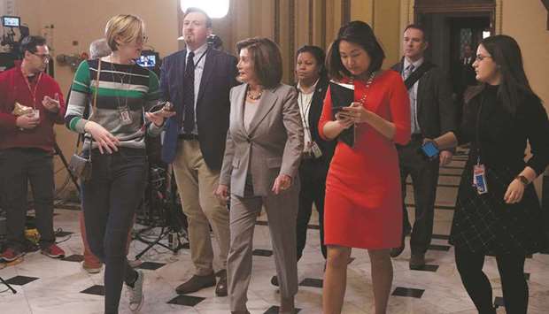 US Speaker of the House Nancy Pelosi (centre) leaves the House floor on Capitol Hill in Washington, DC, yesterday.