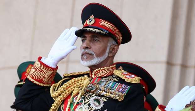 Omanu2019s Sultan Qaboos bin Said salutes at the start of a military parade at a stadium in Muscat on the occasion of the Sultanate's 40th National Day on November 29, 2010. AFP