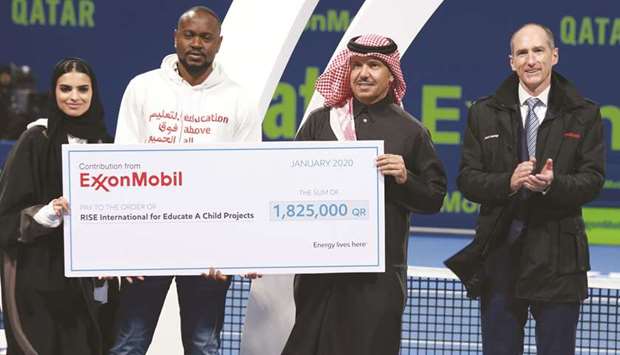 Officials at the presentation of the ceremonial cheque.