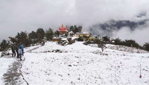 Tehri in Uttarakhand is covered in a thick blanket of snow yesterday.