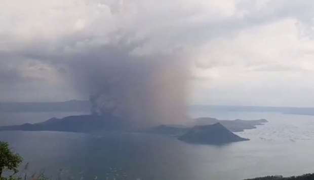 (File photo)  A phreatic explosion from the Taal volcano as seen from the town of Tagaytay in Cavite province, southwest of Manila, on January 12, 2020.  