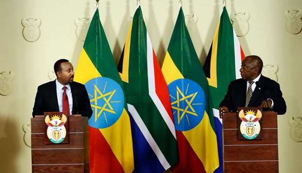 South African President Cyril Ramaphosa (R) and Prime Minister of Ethiopia Abiy Ahmed Ali (L) hold a press conference at the Union Buildings in Pretoria