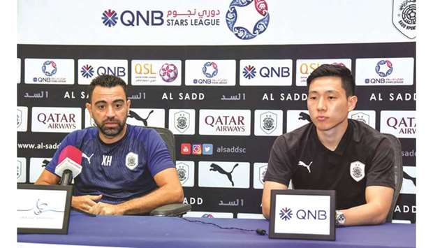 Al Sadd coach Xavi and player Nam Tae-hee speak to the media ahead of their QNB Stars League match against Al Wakrah.