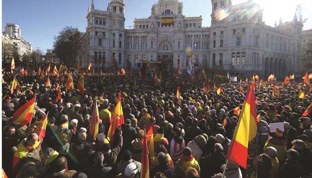Supporters of Spanish far-right VOX party rally in Madrid yesterday against Spanish Prime Minister Sanchezu2019s new coalition government.