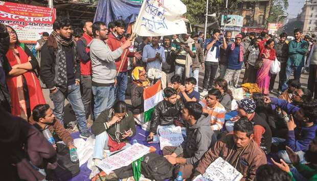 Students shout slogans to protest against Prime Minister Narendra Modi, during a demonstration in Kolkata yesterday.