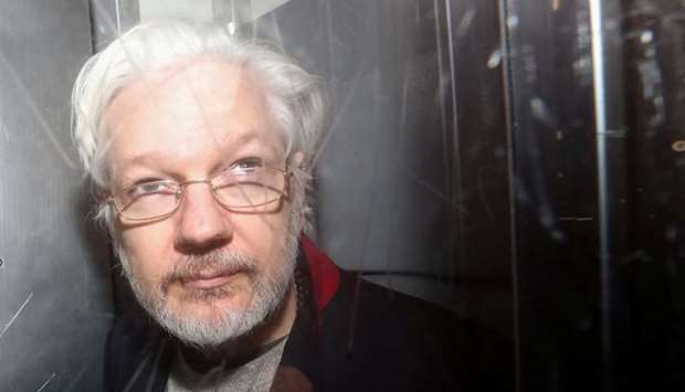 WikiLeaks' founder Julian Assange leaves Westminster Magistrates Court in London, Britain