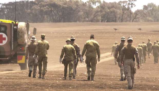Members of the Australian Department of Defence search for deceased wildlife killed by bushfires on Kangaroo Island, South Australia.