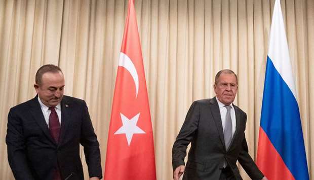 Russian Foreign Minister Sergei Lavrov and his Turkish counterpart Mevlut Cavusoglu hold a joint press conference following the talks on a ceasefire deal between the warring sides in Libya, in Moscow yesterday.