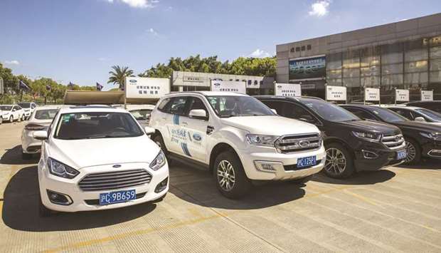 Ford vehicles stand on display at its dealership in Shanghai. Yesterday, Ford said its China auto sales slumped more than a quarter in 2019 for its third year of decline.