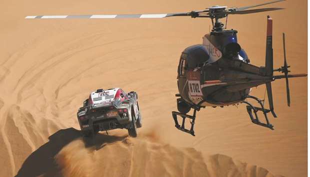 SRTu2019s French driver Mathieu Serradori and Belgian co-driver Fabian Lurquin compete in Dakar 2020. (AFP)