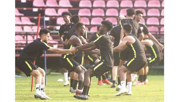 Qatar players during a training session in Bangkok yesterday.