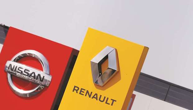 The logos of Renault and Nissan are seen in front of dealerships of the companies in Reims, France. Nissan is u201cin no wayu201d planning to end its partnership with Renault, the Japanese auto giant insisted yesterday after a report suggested a divorce was possible in the wake of the Carlos Ghosn scandal.