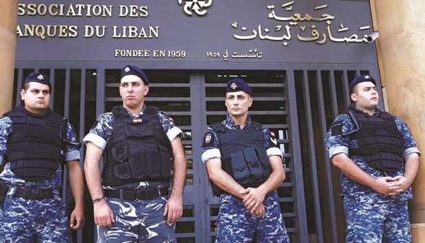 Lebanese police stand outside the entrance to the Association of Banks in downtown Beirut (file).