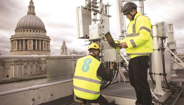 Engineers from EE, the wireless network provider owned by BT Group, inspect Huawei Technologies 5G equipment overlooking St Paulu2019s Cathedral during trials in the City of London on March 15, 2019. u201cWe want to put in gigabit broadband for everybody. If people oppose one brand or another, then they have to tell us whatu2019s the alternative,u201d Prime Minister Boris Johnson said when asked about Huawei in a BBC TV interview yesterday.