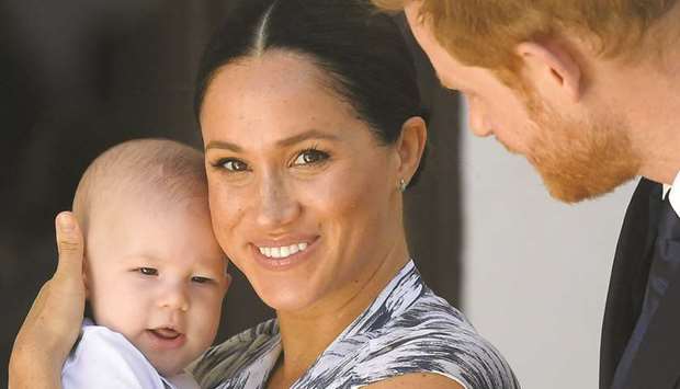 Prince Harry, Meghan, and their son Archie.