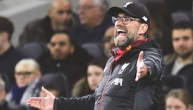 Liverpoolu2019s German manager Jurgen Klopp gestures from the touchline during the English Premier League match against Tottenham Hotspur at Tottenham Hotspur Stadium in London on January 11, 2020. (AFP)