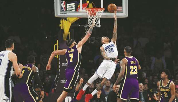 Orlando Magic guard Markelle Fultz (centre) shoots a layup past Los Angeles Lakers center JaVale McGee (third left) during the second half at Staples Center. PICTURE: USA TODAY Sports