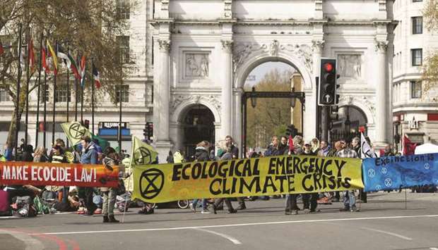 Climate change activists attend an Extinction Rebellion protest in London, Britain, April 15, 2019.