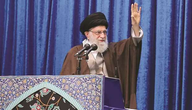 A handout picture provided by the office of Iranu2019s Supreme Leader Ayatollah Ali Khamenei yesterday shows him greeting the crowd during prayers in the capital Tehran.