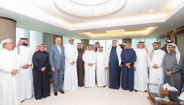 HE al-Kuwari with HE Sheikh Faisal, Alfardan, Issa, Sheikh Hamad, Sheikh Nawaf, Sherida al-Kaabi and Saud al-Mana among other dignitaries following a meeting hosted in his honour by Qatari Businessmen Association at QBA headquarters Saturday