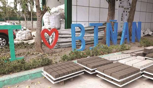 Bricks made of volcanic ash are laid out outside a brick-making facility in Binan, Laguna.