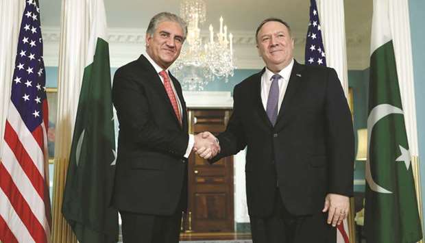 Foreign Minister Shah Mahmood Qureshi with US Secretary of State Mike Pompeo before their meeting on Friday at the State Department in Washington.