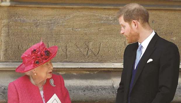 This file photo taken on May 18, 2019 shows Queen Elizabeth and Harry at St Georgeu2019s Chapel in Windsor Castle, Windsor, west of London, after the wedding of Lady Gabriella Windsor and Thomas Kingston.