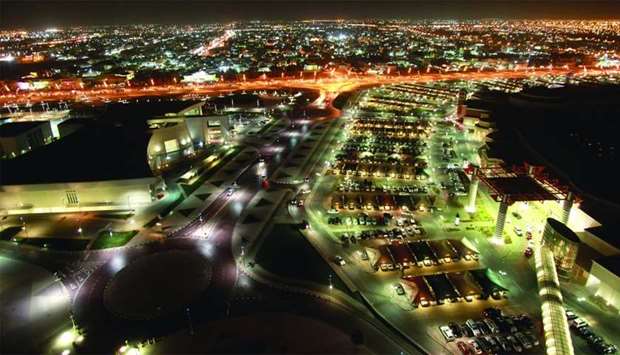 The Al Waab district is seen illuminated at night on the city skyline in Doha (file).