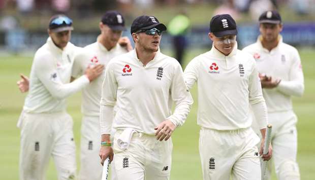 The England team leave the field after their victory over South Africa on the fifth day of the third Test at the St Georgeu2019s Park Cricket Ground in Port Elizabeth yesterday. (Reuters)
