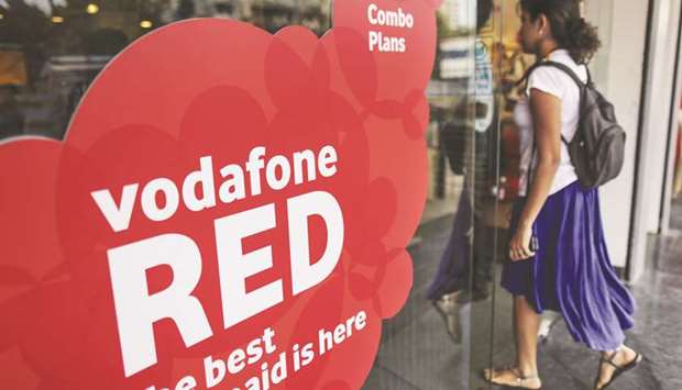A customer enters a Vodafone India store in Mumbai. Several foreign firms including IBM, Royal Dutch Shell and Vodafone have collectively faced billions of dollars in tax claims from Indiau2019s government in recent years, leading to arbitration cases and protracted legal battles in courts.