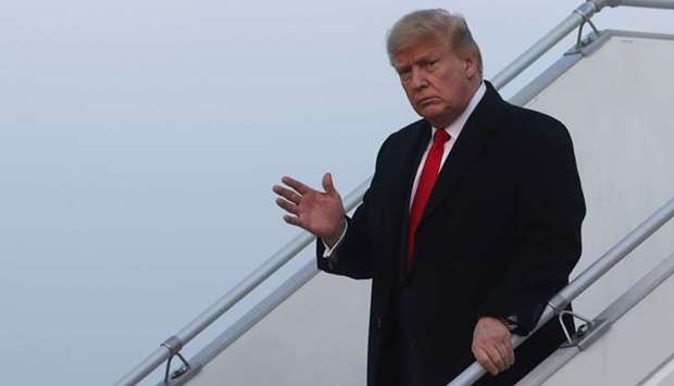 US President Donald Trump arrives aboard Air Force One en route to the Word Economic Forum in Davos, at Zurich International Airport in Zurich, Switzerland