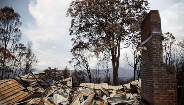 Rubble are seen at a property damaged by bushfires in Kangaroo Valley, Australia