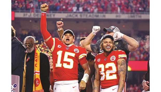 Kansas City Chiefsu2019 Patrick Mahomes (centre) and Tyrann Mathieu (right) celebrate after beating the Tennessee Titans in the AFC Championship Game at Arrowhead Stadium on Sunday. PICTURE: USA TODAY Sports