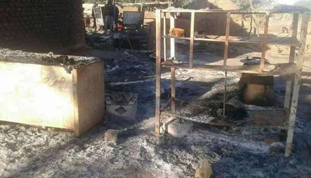 A photo being shared on social media shows one of the torched houses in El Geneina