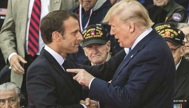 Emmanuel Macron, Franceu2019s president (left), shakes hands with US President Donald Trump, during a ceremony at the Normandy American Cemetery and Memorial in Colleville-sur-Mer, France (file).