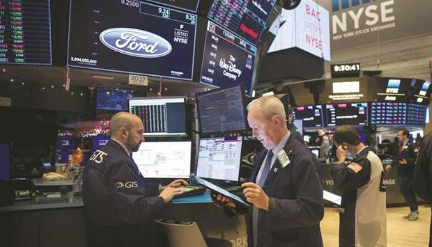 Traders work on the floor of the New York Stock Exchange. US stocks were the standout asset class of 2019, with low global bond yields helping to drive the benchmark S&P 500 index almost 29% higher for its best year since 2013.