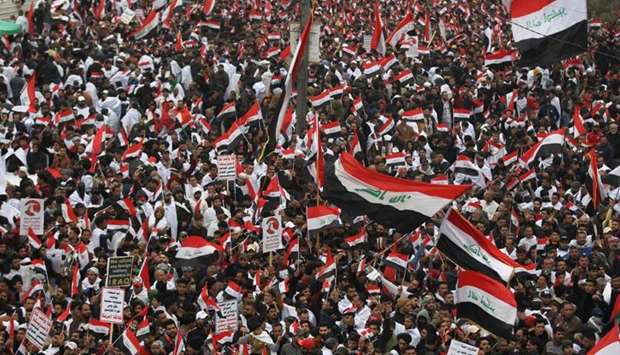 Thousands of Iraqis demonstrate in the heart of Baghdad to demand the ouster of US troops from the country