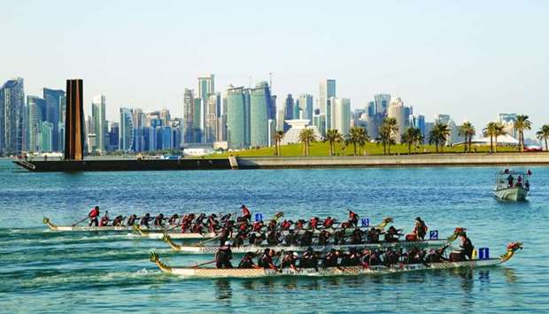 The Doha Skyline serves as a scenic backdrop for the QNB 2020 Qatar Winter Dragon Boat Festival held at the MIA Park. PICTURES: Jayaram.