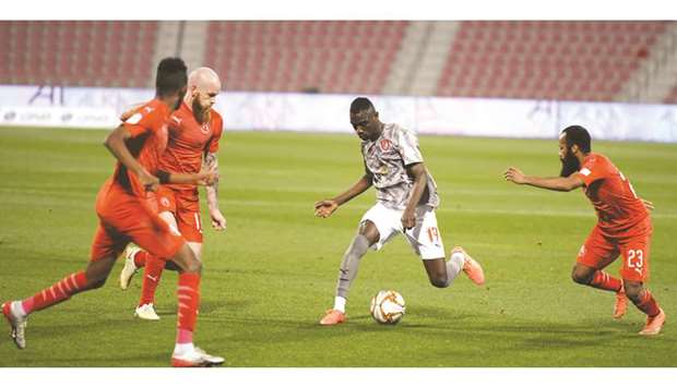 Al Duhail forward Almoez Ali (centre) in action during the QNB Stars League match against Al Arabi yesterday. PICTURE: Shemeer Rasheed