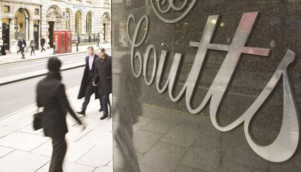 Pedestrians walk past a branch of Coutts & Co, the private banking division of the Royal Bank of Scotland Group in London. Couttsu2019s growth strategy portfolio, which combines stocks, bonds and alternative assets, returned 17% last year.