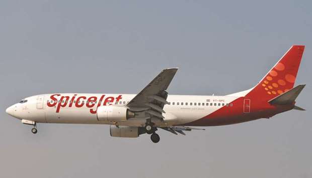 A SpiceJet aircraft prepares to land at Mumbai International Airport. Boeing Co is in talks with India to set up a flight simulator for its grounded 737 MAX jet in India by April or May, SpiceJet chairman Ajay Singh said.